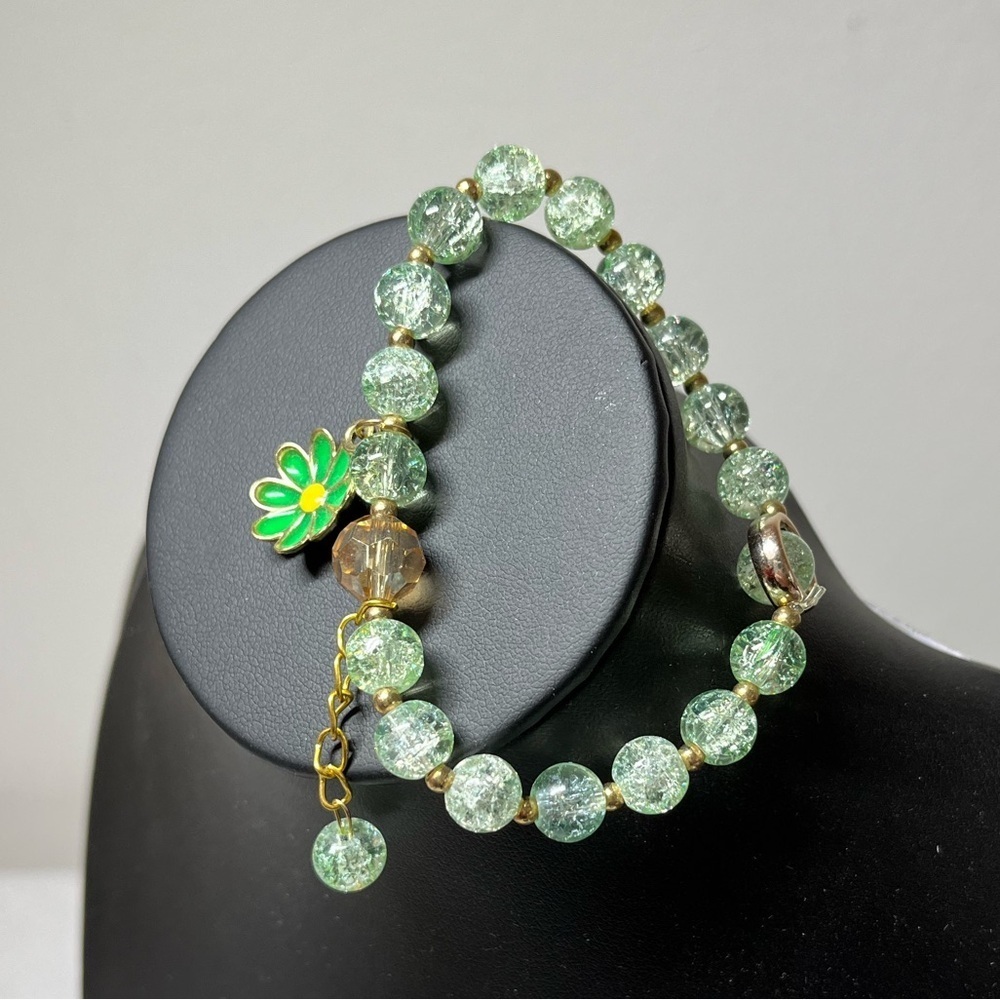 Green Beaded Stretch Bracelet with Flower Charm & hanging bead charm. Stack em